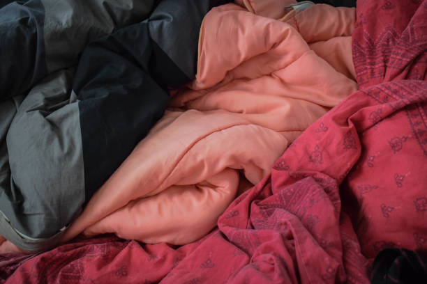 istock Pile of duvets and sheets 1125669877