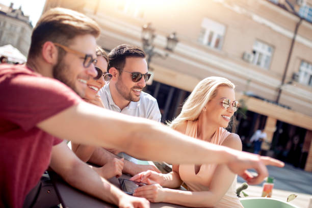 istock Group of four friends having fun together 1125670466