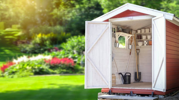 storage shed filled with gardening tools. - shed imagens e fotografias de stock