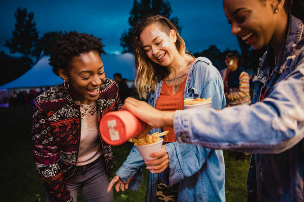 istock Sharing Chips at a Festival 1125675139