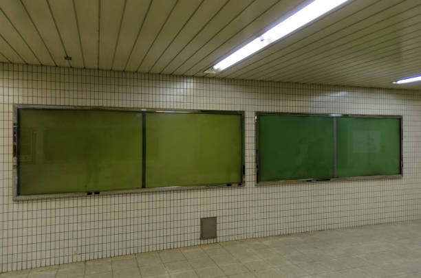 istock big blank advertising billboard on wall with copy space for your text message or media and content in subway train station or airport, information board, banner, marketing and advertising concept 1125677356