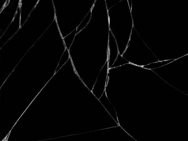 istock Cracked glass texture on black background 1125679254