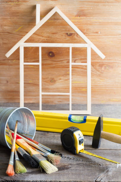 Home renovation construction abstract background with tools on wooden boards diy still life