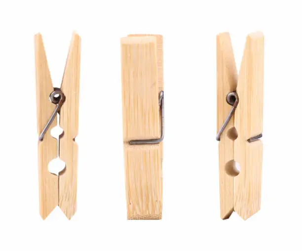 Wooden clothespin isolated.