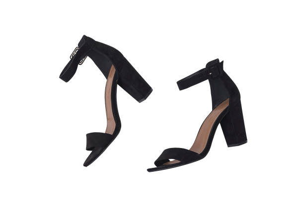 istock Black shoes with hills isolate on white background, flat lay. 1125680757