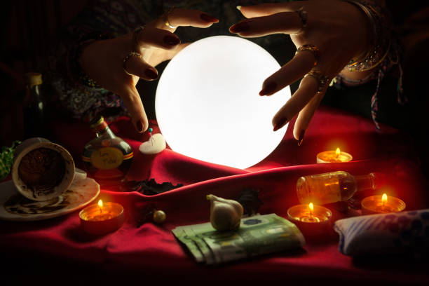 istock Hands from fortune teller above crystal ball 1125684778