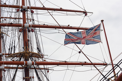 ship masts, rigging and british flag