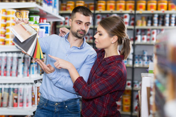 istock couple is choosing color for materials with pallete 1125685051