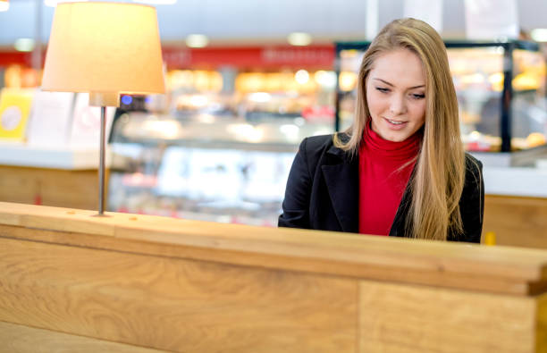 istock Young beautiful  woman working in restaurant 1125685615