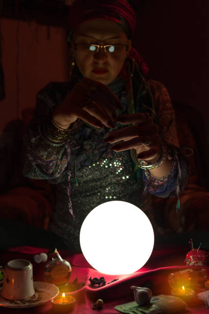 istock Woman fortune teller doing sorcery 1125685722