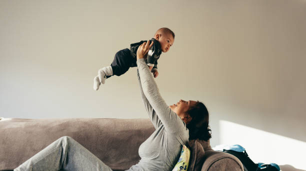 istock Woman spending time playing with her baby 1125687793