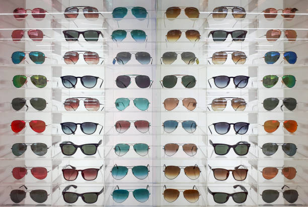 istock Eyeglasses and sunglasses on shelves 1125688466