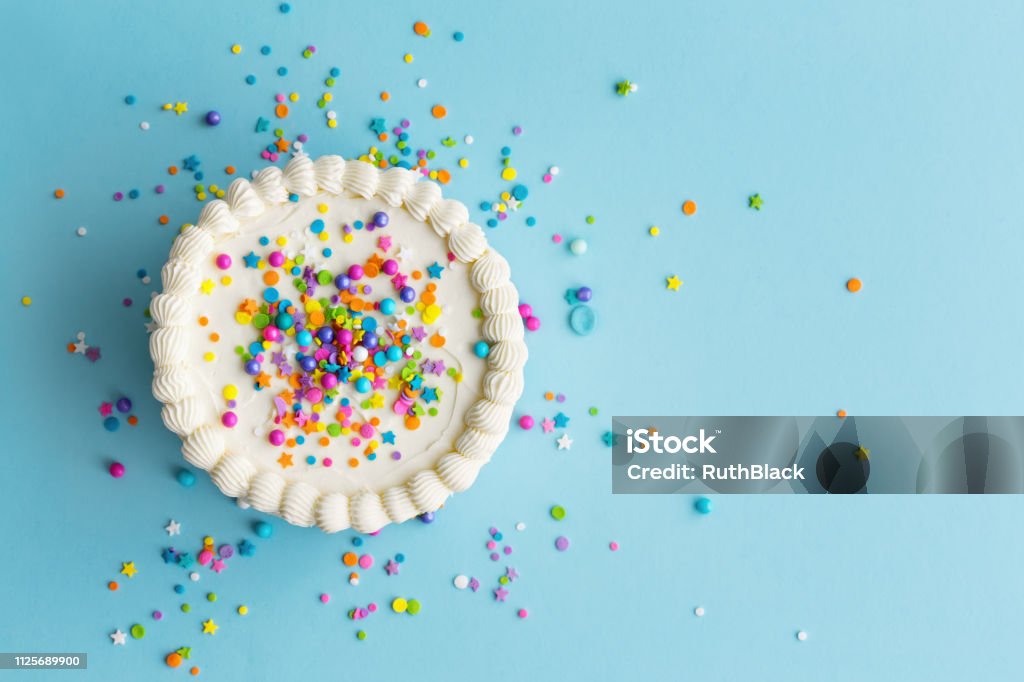 Colorful birthday cake top view Birthday cake top view with colorful sprinkles Cake Stock Photo