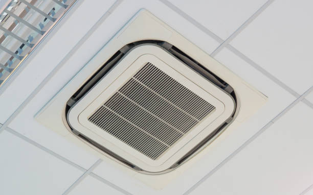 istock Air conditioner installed on the ceiling of a room 1125690608