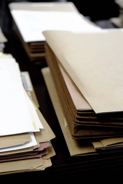 istock Files and Folders on Desk Work Busy Information working 1125692338