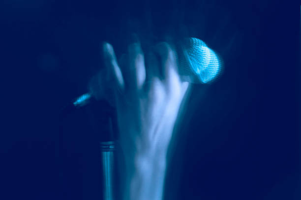 istock The movement of hands is holding the microphone. 1125693596