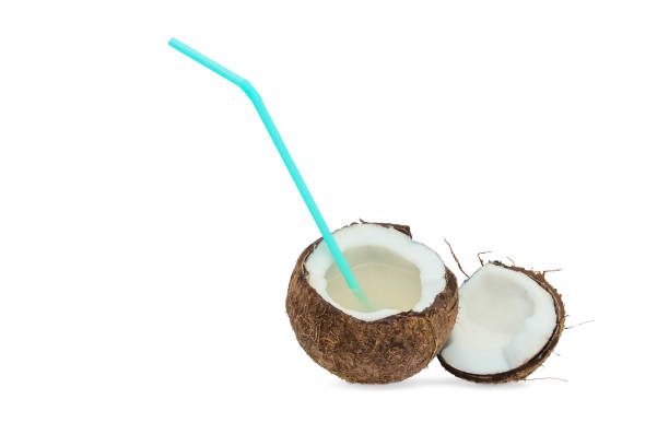 istock Coconut split in half withcoconut milk isolated on white background with shadow. 1125694223