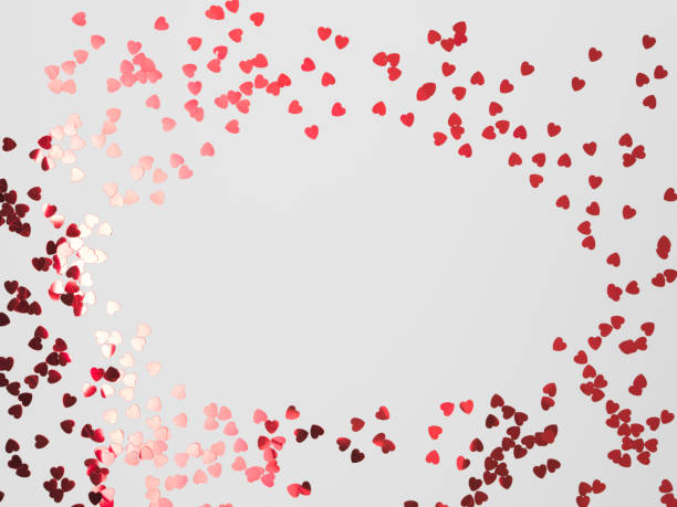 istock many, little glittering red hearts on white background 1125699999