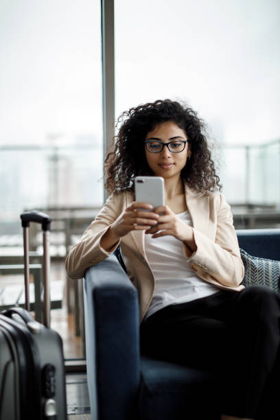 istock Young businesswoman using mobile phone 1125703926