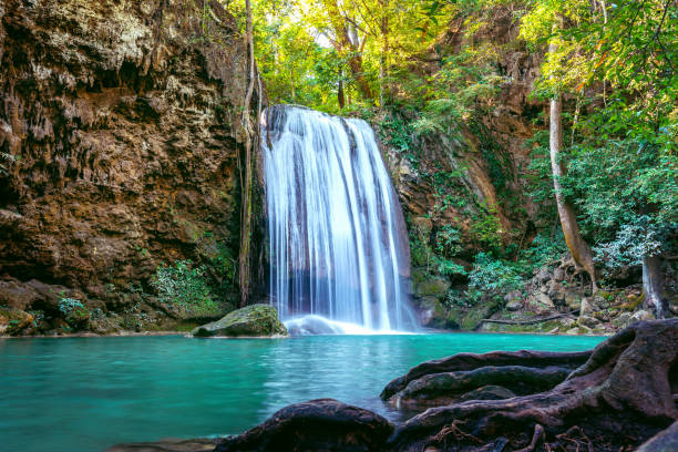 istock Erawan waterfall in Thailand. Beautiful waterfall with emerald pool in nature. 1125704120