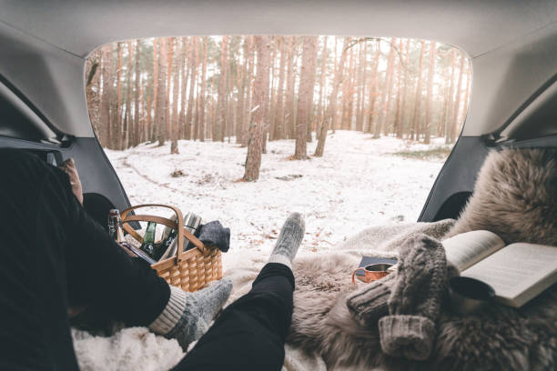 istock A man on a winter picnic in his car trunk 1125705466