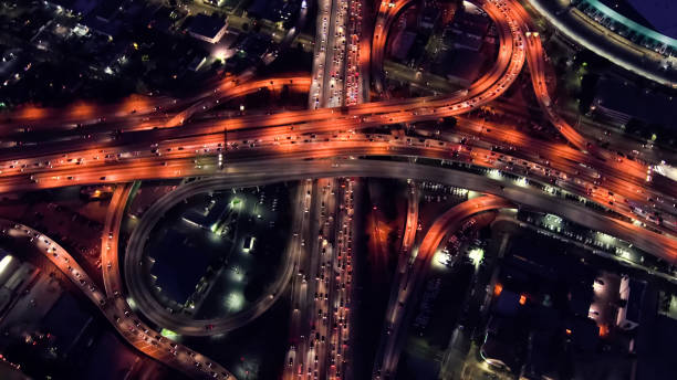 istock Aerial View Of Multiple Lane Highway At Night 1125706093