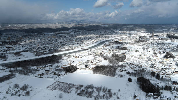 istock High Angle View Of Snow Covered Cityscape Against Sky 1125706099