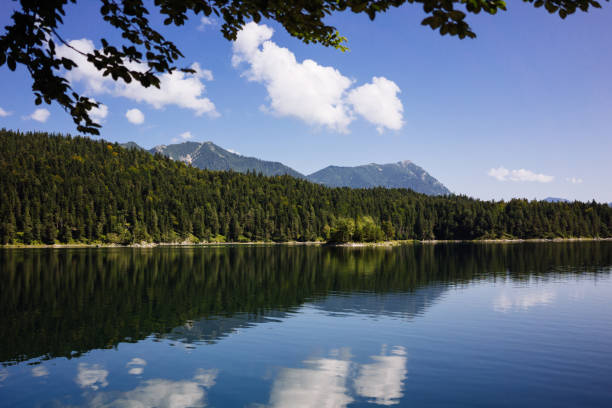 istock Alpine landscape with the Eibsee lake against mountains 1125706265