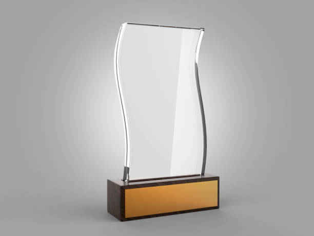 istock Blank glass trophy mock up stand on wooden base, 3d rendering illustration. 1125707605