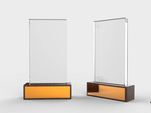 Blank glass trophy mock up stand on wooden base, 3d rendering illustration. Blank glass trophy mock up stand on wooden base, 3d illustration. glass material stock pictures, royalty-free photos & images