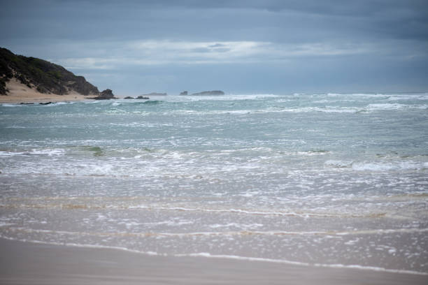 Grassy Beach, Grassy Heads, Macleay Valley, views over Grassy Beach with mist and waves at dawn, sunrise over Grassy Heads,