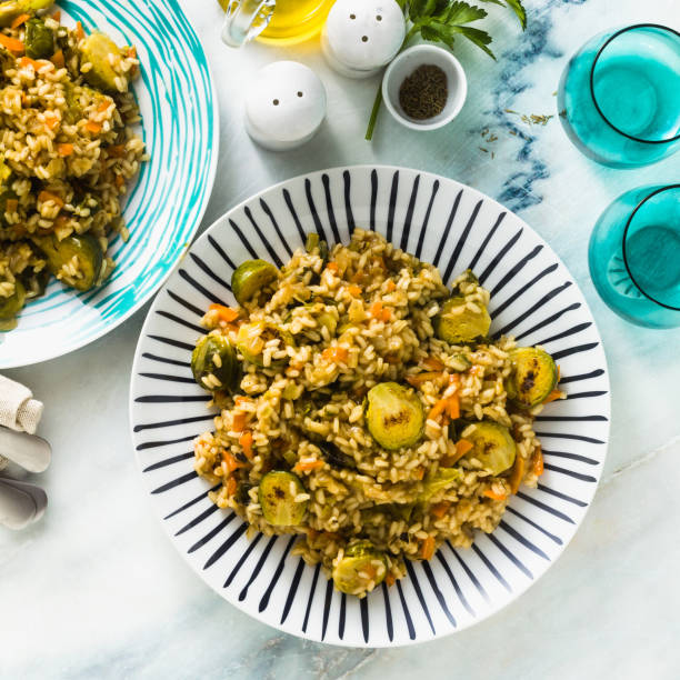 istock spring risotto on a marble table with spices and olive oil 1125715373