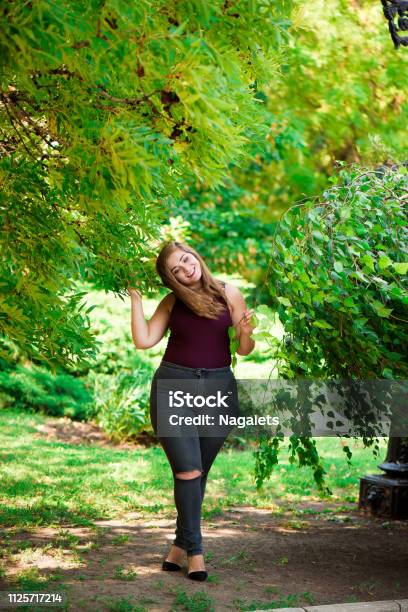 Young beautiful plus size model outdoors, xxl woman on nature. Stock Photo