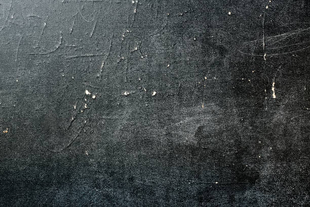 istock Black surface with scratches. Abstract background stained with chalk. 1125717840