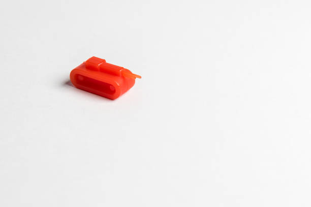 A red tank on a white background stock photo