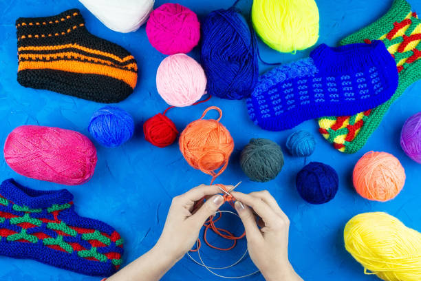 istock girl knits sock knitting needles 1125720070