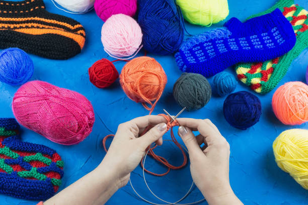 istock girl knits sock knitting needles 1125720075
