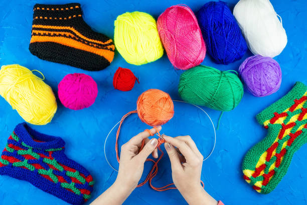 istock girl knits sock knitting needles 1125720105