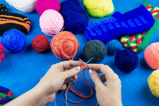 istock girl knits sock knitting needles 1125720131