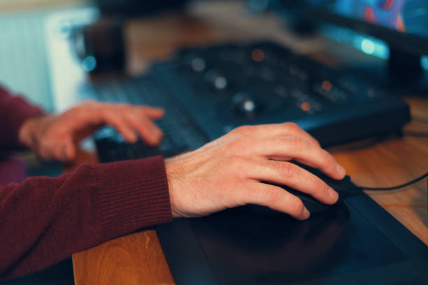 istock Video editor hands adjusting color or sound on working console machine 1125724095