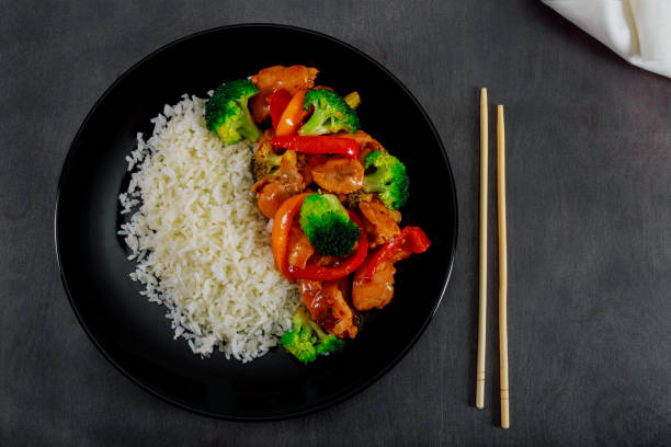 istock teriyaki chicken and broccoli stir fry with rice selective focus 1125725409