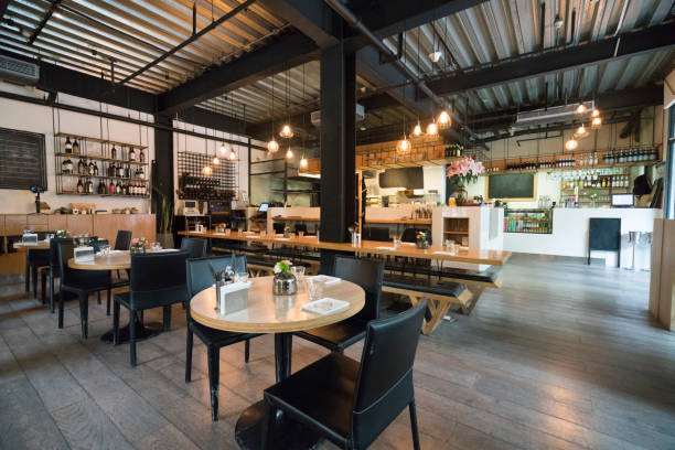 The "It" place Interior design of a modern restaurant. cafe interior stock pictures, royalty-free photos & images