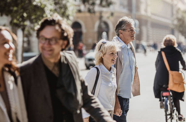 istock Small Group of People Walking Down The City 1125726538