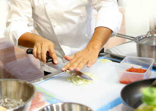 istock Chef cooking food in the kitchen, Chef preparing food 1125731959