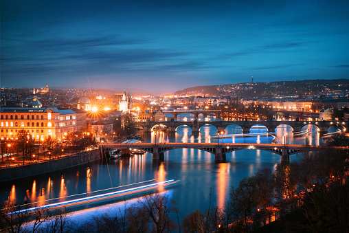 Prague cityscape at night. Aerial view of the bridges on the Vltava river