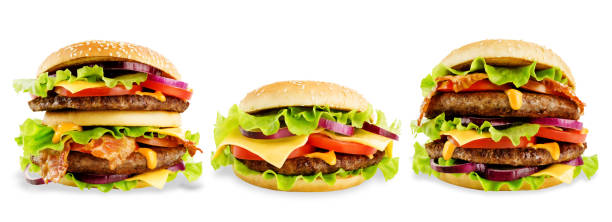 istock Meat Burger with salad, cheese, tomato and cheese sauce isolated 1125734927