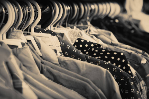 istock Clothes hanging on the rack in the store 1125739215