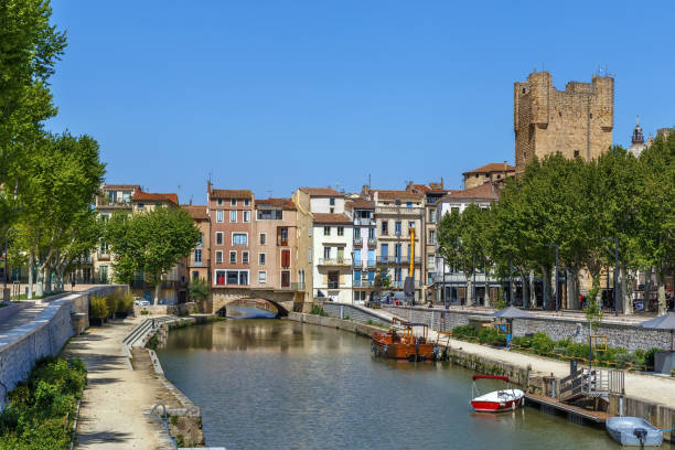 Canal de la Robine, Narbonne, France View of Canal de la Robine in Narbonne, France narbonne stock pictures, royalty-free photos & images