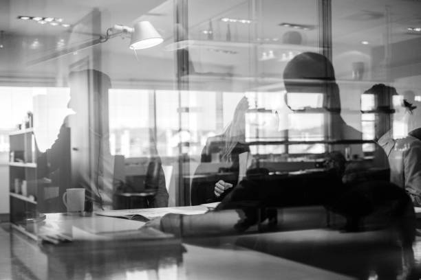 istock Abstract office workers in the meeting 1125740843