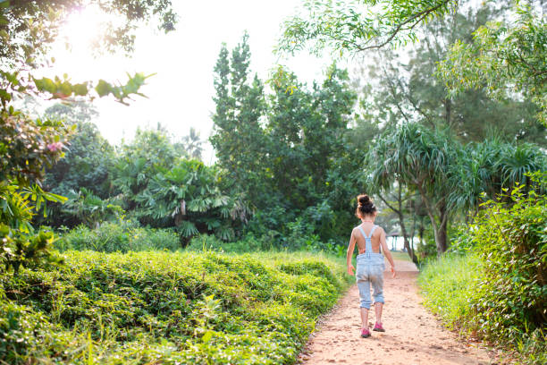 istock Girl walking trail 1125741644